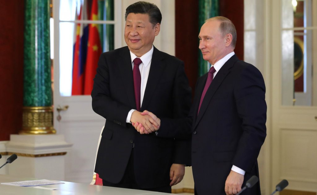 俄羅斯總統蒲亭與中國領導人習近平透過網路視訊，共同見證中俄東線天然氣管道北段「西伯利亞力量管道」開通（圖／克里姆林宮官網）
