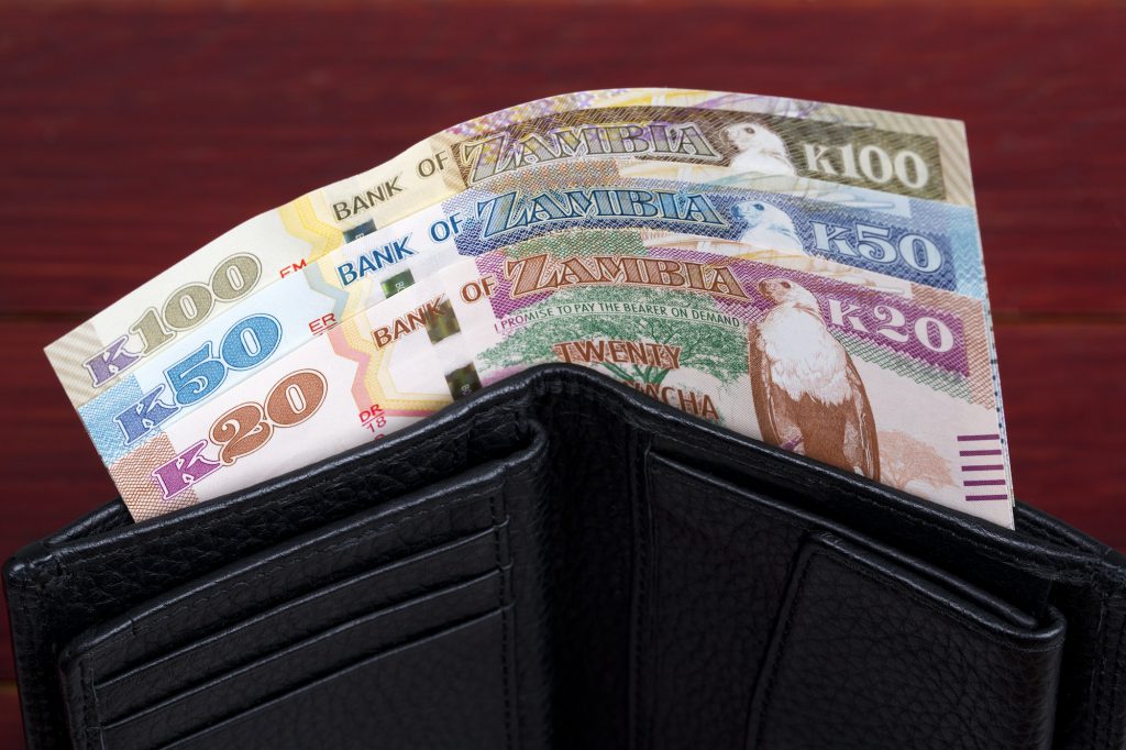 Zambian money in the black wallet