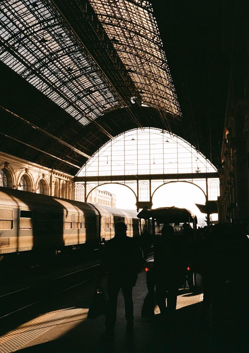 A train station bathed in sunlight.